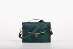 CLUTCH BAG WITH DECORATIVE METAL ACCESSORIES AND HANDLE IN DARK GREEN