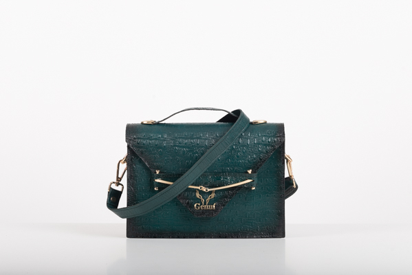 CLUTCH BAG WITH DECORATIVE METAL ACCESSORIES AND HANDLE IN DARK GREEN
