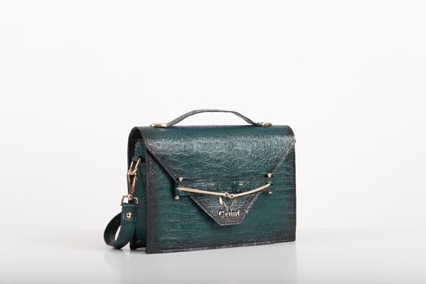 CLUTCH BAG WITH DECORATIVE METAL ACCESSORIES AND HANDLE IN DARK GREEN