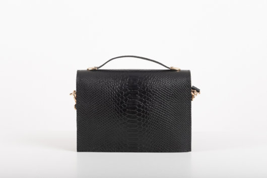 CLUTCH BAG WITH DECORATIVE METAL ACCESSORIES AND HANDLE IN BLACK