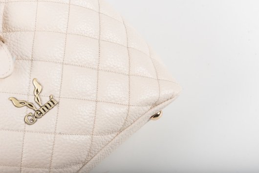 QUILTED BACKPACK IN CREAM